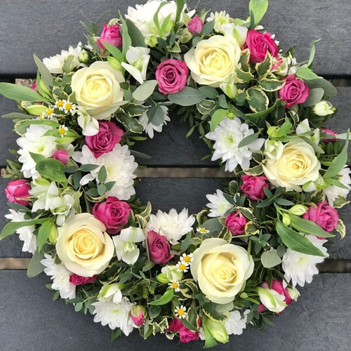 Red Roses and mums round wreath